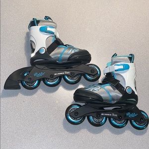 Gently used kids adjustable sizing rollerblades